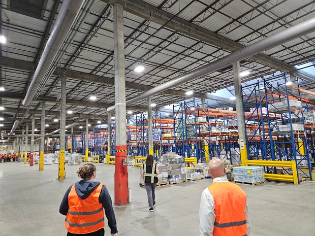 image of group touring warehouse