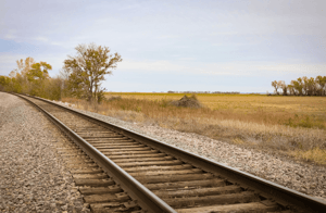 Railroad tracks near farm land