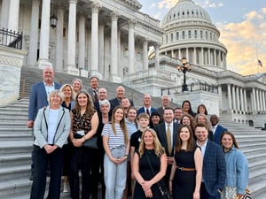 Group of Siouxland leaders standing on the steps of the U.S. Capitol building in Washington, D.C., with the Capitol dome visible in the background.