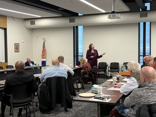 Senator Cailtin Drey standing addressing room