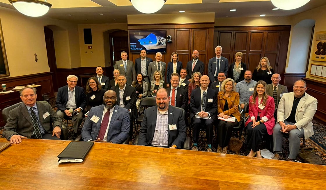 Michelle Bostinelos and Siouxland Chamber representatives posing together inside the Iowa State Capitol after meetings with Governor Kim Reynolds and state leaders about Siouxland’s economic and infrastructure priorities.