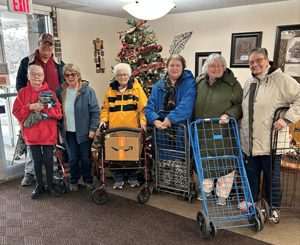 Photo of Onawa residents ready to head to food bank