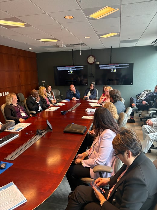 SRTS with IPTA in D.C. inside board room discussing