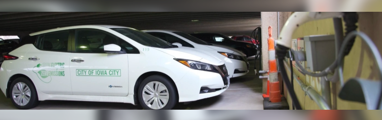 city of iowa city electric car in parking garage charging